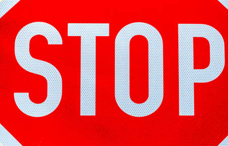a stop sign by the roadside. photo icon for support and exit