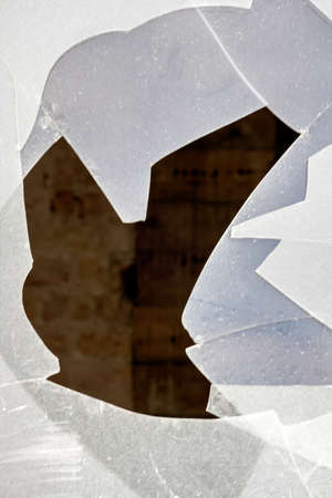 a broken window on a patio door