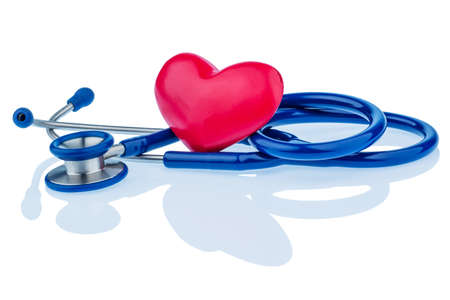 a heart and a stethoscope are adjacent. symbolic photo for heart disease and heartache.の写真素材