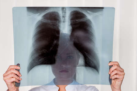 a nurse or doctor in surgical clothing before surgery. symbolic photo for work in the hospitalの写真素材