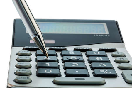 a red pen is on a calculator. save on costs, expenses and budget for bad economyの写真素材