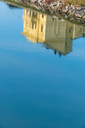 Building reflected in the water, a symbol of peace, idyllic, meditationの写真素材