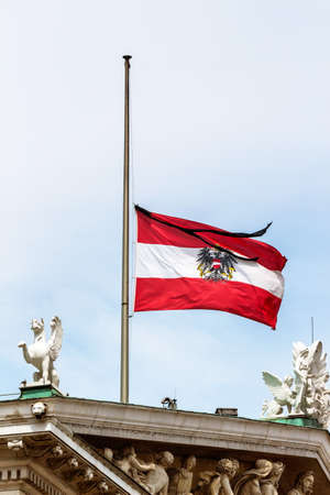 austria federal service flag half-mast, symbol of the state, grief, patriotismの写真素材