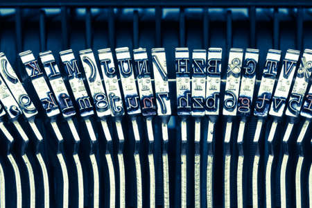 letters of an old typewriter. symbolic photo for communication in former timesの写真素材