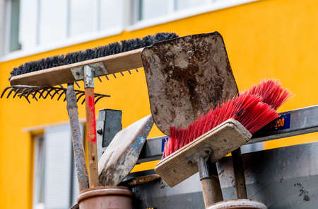 tools for cleaning and gardening. broom and shovelの写真素材