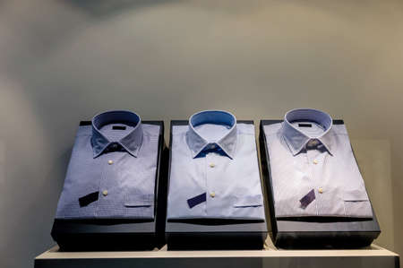 three men's shirts in addition to other, symbol of clothing, fine variationsの写真素材