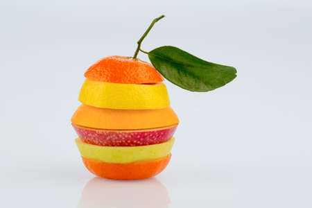 several different slices of fresh fruit with many vitaminsの写真素材