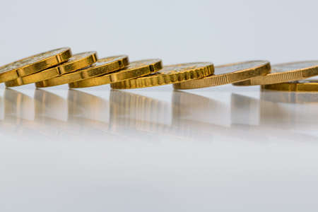 coins are in a riehe, symbolfot for low interest rates, poor returns, fixed costsの写真素材