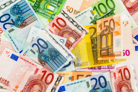 many different euro bills. symbolic photo for wealth and investment.