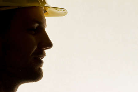 a worker in a business enterprise (craftsmen) with tools in handの写真素材