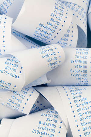 the stripes of a calculator. symbolic photo for cost, scheduling, costing, profit and revenueの写真素材