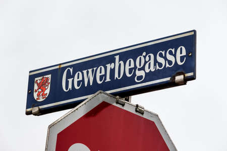 a street in a city called gewerbegasse.の写真素材
