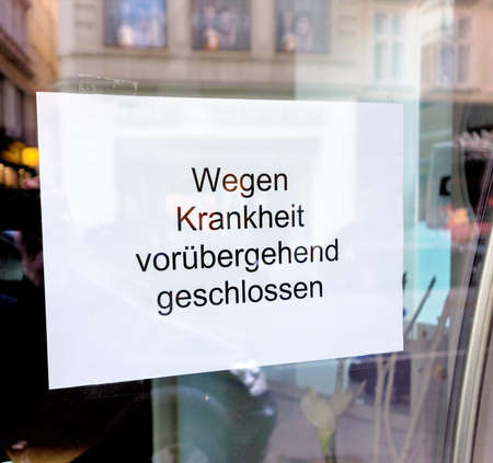 sign in schaufling nests of a shop. due to illness pass closed.の写真素材
