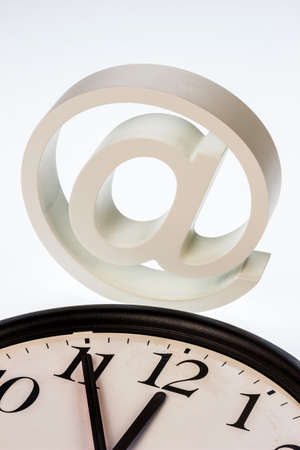 a clock that \11:55\ shows and an e-mail: symbol photo for reform of data protection