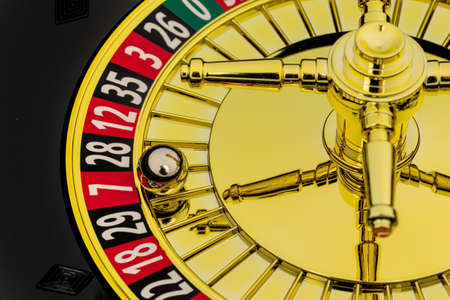 the cylinder of a roulette gambling in a casino. winning or losing is decided by chance.