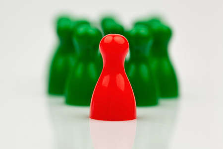 red and green pawns. manager and leader of the team.の写真素材