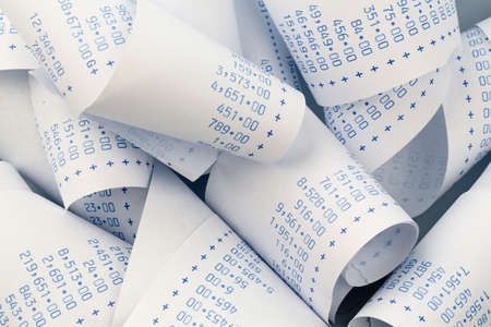 the stripes of a calculator. symbol photo for costs, planning, costing, profit and revenueの写真素材