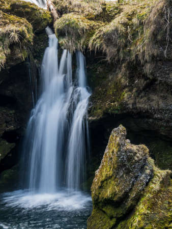 water flows over a waterfall. beauty of natureの写真素材