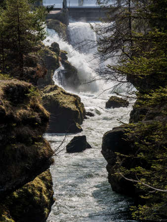 water flows over a waterfall. beauty of nature