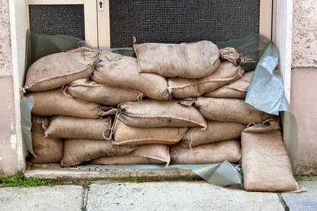 floods in passau. bavaria. germany. sandbags protect against the waterの写真素材