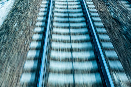 austria, upper austria, linz, wels. seen rails of a railway from a moving train between linz and wels fromの写真素材