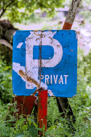 old signboard of a private car park on a grounds.の写真素材