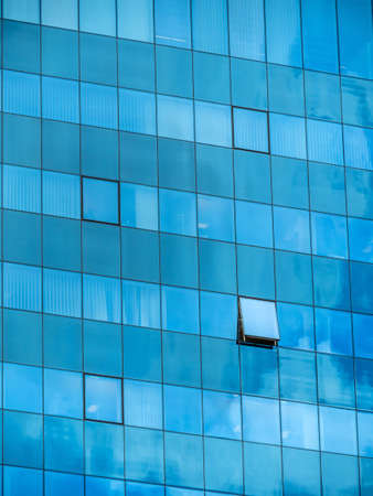 in a modern office building, a window is opened.の写真素材