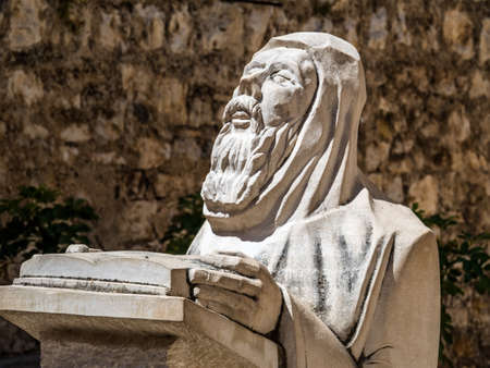 croatia. hvar. praying monk before benedictine monastery
