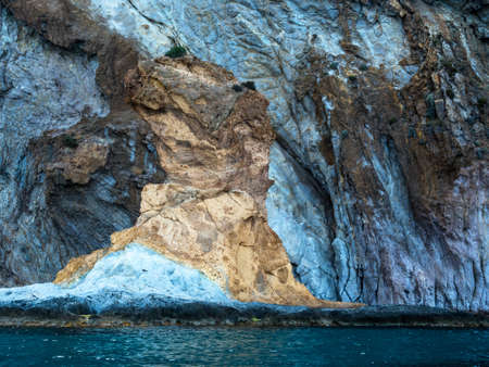 interesting rocks in a bay in central italyの写真素材