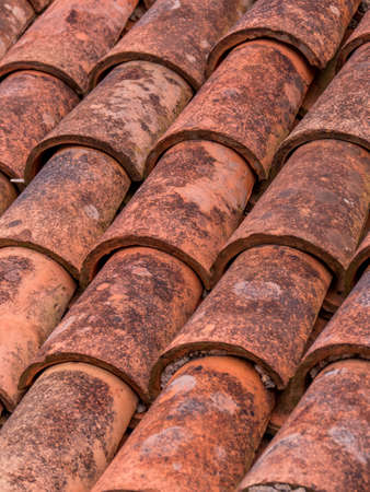 typical mediterranean roof tiles on a houseの写真素材