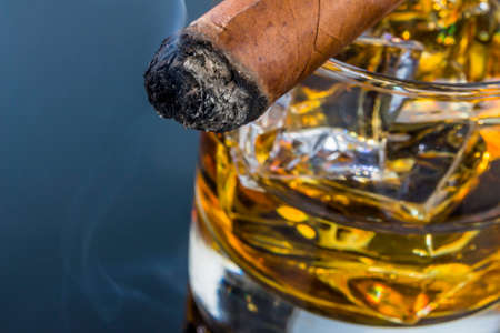 cigar and whiskey. an icon photo for addiction and related