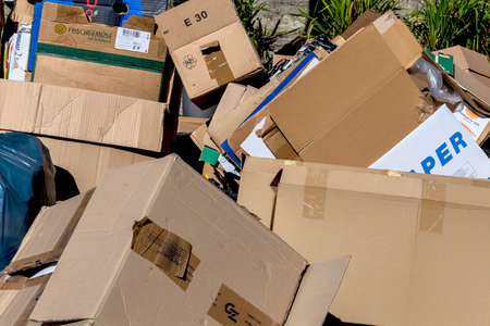 cartons waiting to be picked up by the garbage disposal. recycling of waste paper.の写真素材