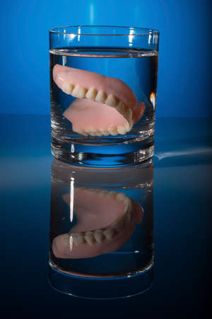 dentures in a teacupの写真素材