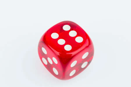 red dice, symbol photo for gambling, risk and gambling addictionの写真素材