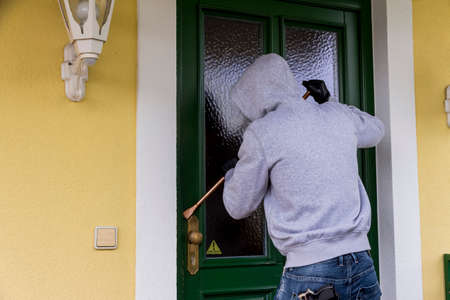 burglar on a doorstepの写真素材