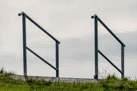 railing on the shoreの写真素材