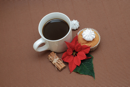 A cup of coffee and cupcakeの写真素材