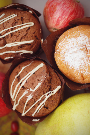 Delicious sweet muffins baked with various fruitsの写真素材