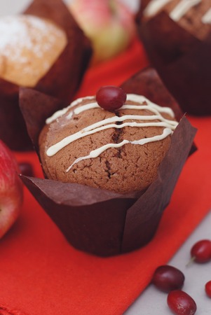 Muffin on a white plate on the table. Vertical.の写真素材