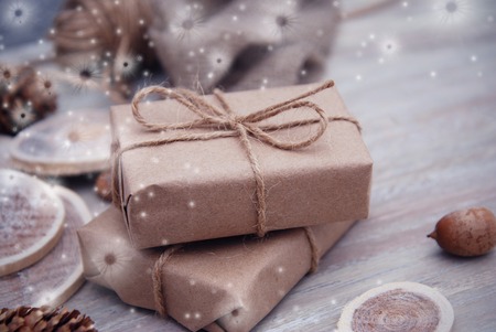 Kraft paper gift box with ribbon bow from above, white backgroundの写真素材