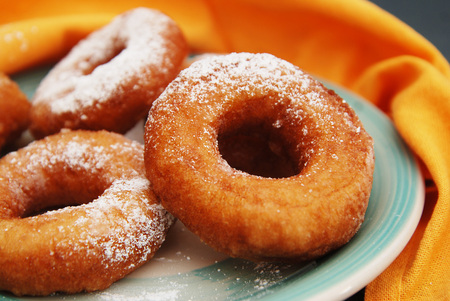 Sugar Ring Donut Isolated on a orange napkin White Backgroundの写真素材