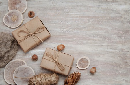 Rustically wrapped Christmas Giftswith woods, Pineconeの写真素材