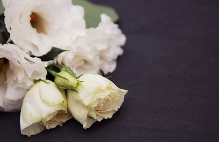 White Eustoma Flowers on black backgroundの写真素材