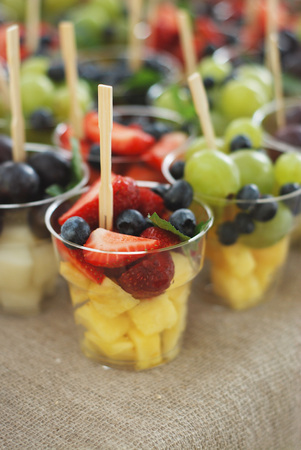 Glass of fruit salad isolated. Peaneapple exotic fruit.の写真素材