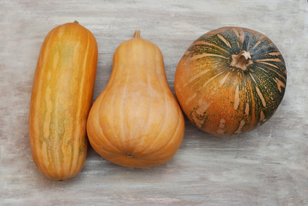 Autumn pumpkins on wooden board table. Topの写真素材