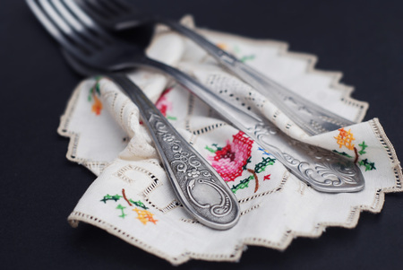 Silver fors on Embroidered kitchen napkin close