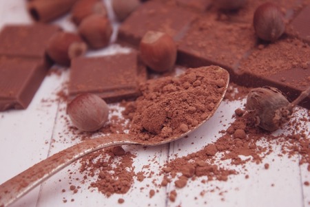 Brown Chocolate Powder on a Spoon Overの写真素材