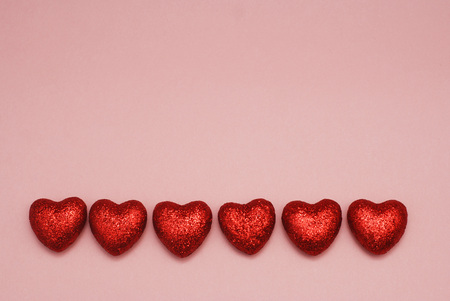 Happy Valentine Day Festive Sparkle Red Hearts on Pink Background. Isoalted. Valentines Day Greeting Template with Copy Space.の写真素材