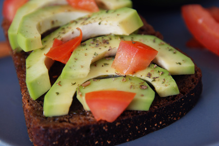 Vegan Sandwich with Avocado and Vegetables on Bread Toast, Close-upの写真素材