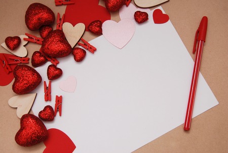 A Blank Paper for Copy Text and Mesage Surrounded by Glitter and Shiny Hearts with Pencil. Heart shaped Valentines Day.の写真素材